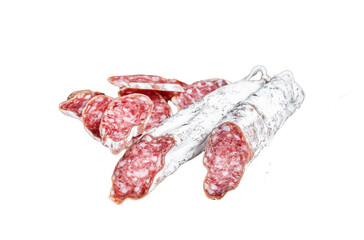 Spanish dry salami sausage Fuet on wooden cutting board.  Transparent background. Isolated.