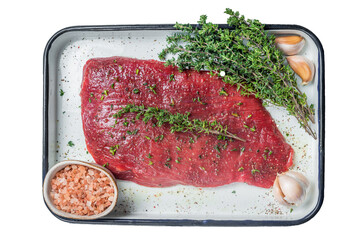 Marinatad flank beef steak with herbs and olive oil, raw meat.  Transparent background. Isolated.