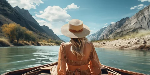 Foto op Aluminium A blond lady riding a boat on a lovely mountain river. Generative Ai. © MinixT