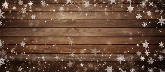 Foto op Aluminium Holiday backdrop featuring brown wooden texture adorned with snowy white stars Copy space image Place for adding text or design © Ilgun