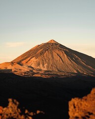 there is a mountain that looks like it is in the distance: El Teide, volcano, Tenrife