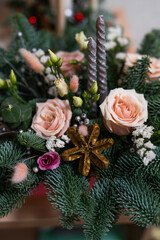 Christmas bouquet. Red flower of carnation, cone and cotton with