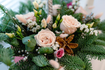 Christmas bouquet. Red flower of carnation, cone and cotton with