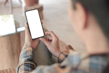 cell phone blank white screen mockup.hand holding texting using mobile on desk at office.background empty space for advertise.work people contact marketing business,technology