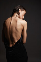 Naked Female back. young wet woman in the towel. Beautiful sexy Girl with wet Hair © eugenepartyzan