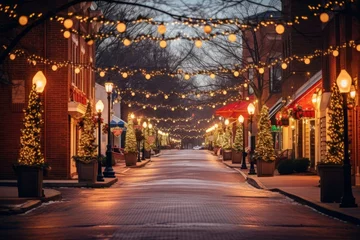 Fotobehang A picturesque view of a town's main street adorned with sparkling Christmas garlands © aicandy