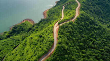 view of highway in the mountains, Top view of countryside road passing through the green forrest and mountain