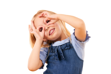Girl child, fun and hand glasses for playing, free and funny gesture isolated on png transparent background. Finger, frame and kid with silly expression, mood or personality with playful or games