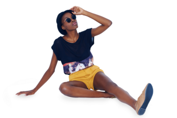 Hipster, fashion or black woman on floor, smile and stylish outfit isolated on transparent background. African person, model or girl on ground with glasses, casual and png with happiness or relax