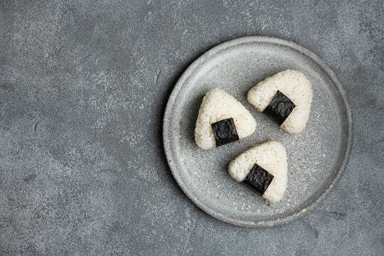 Japanese Tuna Mayo Onigiri, traditional japanese food, copy space