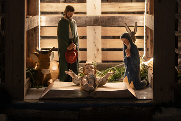 Christmas creche with Joseph Mary and Jesus Christ - obrazy, fototapety, plakaty