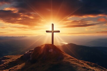 Creative religion concept. Cross at top of hill mountain with sunset ray dawn. glowing end clouds skies landscape. Christian religious - obrazy, fototapety, plakaty