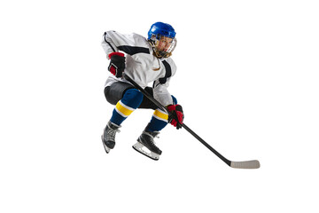 Young girl, hockey player in motion during game, training, jumping, playing isolated over white background. Concept of professional sport, competition, game, action, hobby