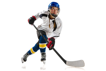 Young girl, athlete, hockey player in motion, training, playing isolated over white background....