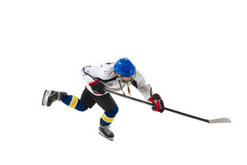 Top view image of young girl, hockey player in motion during game, training, playing isolated over white background. Concept of professional sport, competition, game, action, hobby