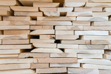 Stacks of lumber being stored in a warehouse