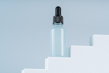Hero top view of face serum or gel on a white podium, product presentation, marketing strategy