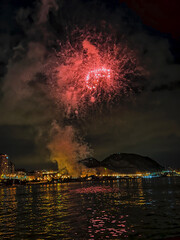 colorful fireworks in the night sky on the seafront of Alicante spain