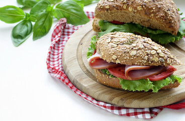 healthy eating sandwich rye bread with vegetables and basil