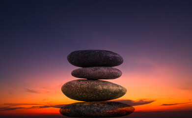Obraz na płótnie Canvas Stone Balance Sunset Background Tower Pebble on Rock Stack Perfect Pile Scene Free Space Sunrise Concept Peace Relax Nature Harmony Broken Heart, Pyramid Zen Garden Japan Table Meditation Stability