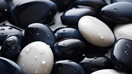 Küchenrückwand glas motiv Black and white pebbles on the beach with water drop background. © Virtual Art Studio