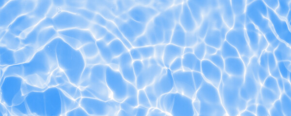 Fototapeta na wymiar Abstract transparent water shadow surface texture natural ripple on blue background
