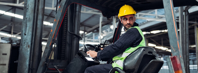 Industrious Engineer Operating Forklift in Warehouse. Efficient Forklift Driving in Factory....