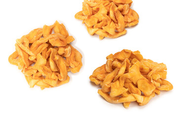 Dried melon slices isolated on a white background.