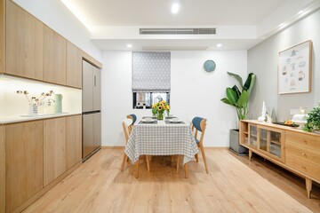 Beautiful modern minimalist kitchen interior with a wooden furniture set