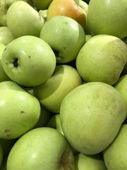 Yogyakarta, Indonesia - November 15, 2023: Full frame of Fresh Green Apple. Green Apple in a group