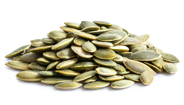 Pumpkin seeds heap isolated on white background, cropping