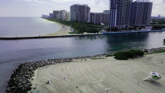 Ascending drone footage of Haulover Inlet and Beach Park and Haulover Beach in Miami, Florida, USA