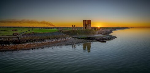 Stunning view of Historic Reculver Towers at sunset. Kent, England