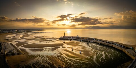 Aerial view of Margate Harbour Arm at sunset overlooking the sea. Kent, England