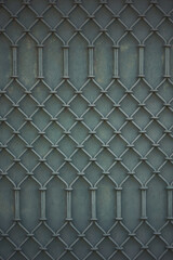 Grid iron grates, Grid pattern, steel wire mesh fence wall background. Green wire fence. Old and...