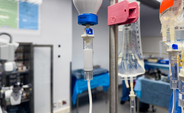 hospital drips against a sterile background, medical equipment providing care and treatment
