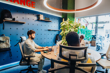 Diverse professionals collaborate in a creative co-working space, solving problems and completing...