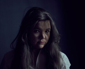 Fototapeta premium young woman portrait low key