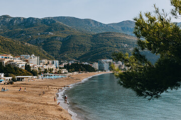 Fototapeta na wymiar Amazing view of the Adriatic sea and a beach in Becici near Budva. Travel destination in Montenegro.