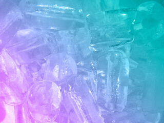 Blue and Purple Transparent crystals on purple-blue background. Fresh cool ice cube background
