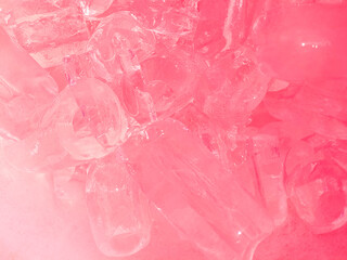 Pink Transparent crystals on pink background. Fresh cool ice cube background