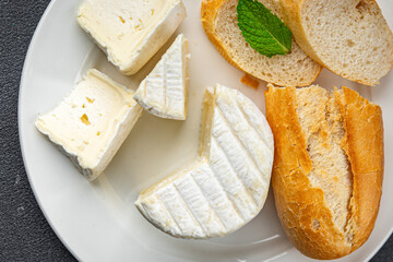 cheese soft creamy white mold strong taste eating cooking appetizer meal food snack on the table copy space food background rustic top view