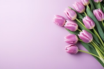 Bouquet Tulips on purple background. Mother's day, Valentine's Day, Birthday celebration concept. Greeting card. Copy space for text, top view