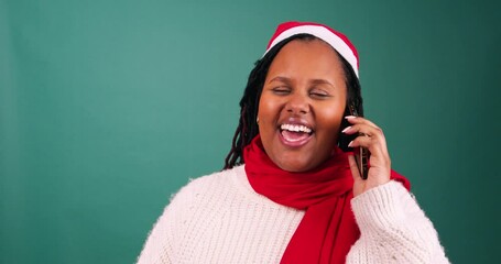 Happy young woman makes phone call talking and laughing at Christmas, studio - Powered by Adobe