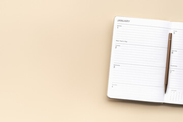 planner with the first week of January 2024 on a beige background