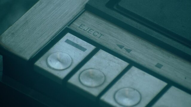 tape recorder eject tape button press