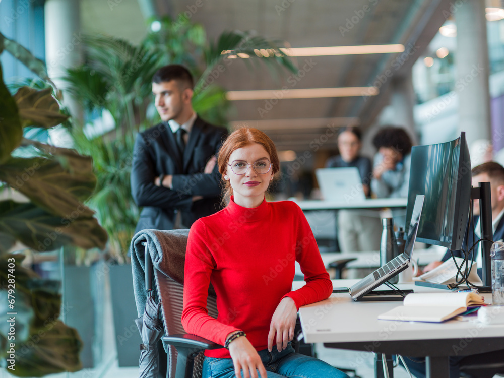 Wall mural In a modern startup office, a diverse group of young professionals collaboratively tackles various business problems and challenges, surrounded by their engaged colleagues, fostering innovation and