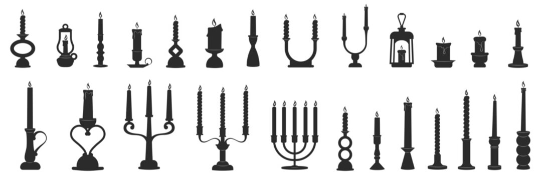 Retro candles in candlesticks set. Candle holders