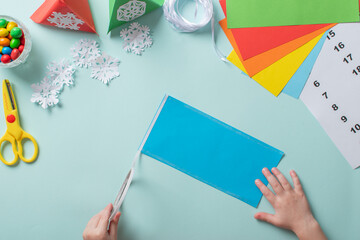 Advent calendar made of colored paper. Step-by-step instructions for making Christmas crafts. Diy...