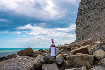 Bottle of wine by the sea